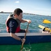 Wounded Warriors participate in outrigger canoe paddling as part of Warrior Care Month