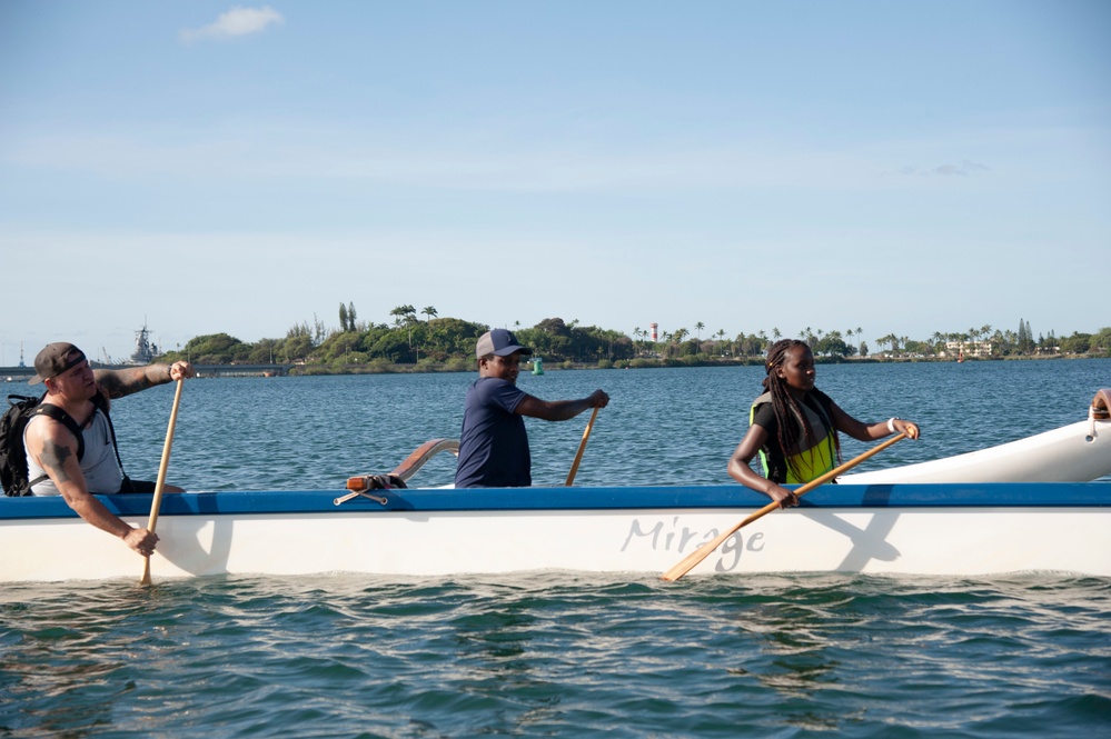 Wounded Warriors participate in outrigger canoe paddling as part of Warrior Care Month