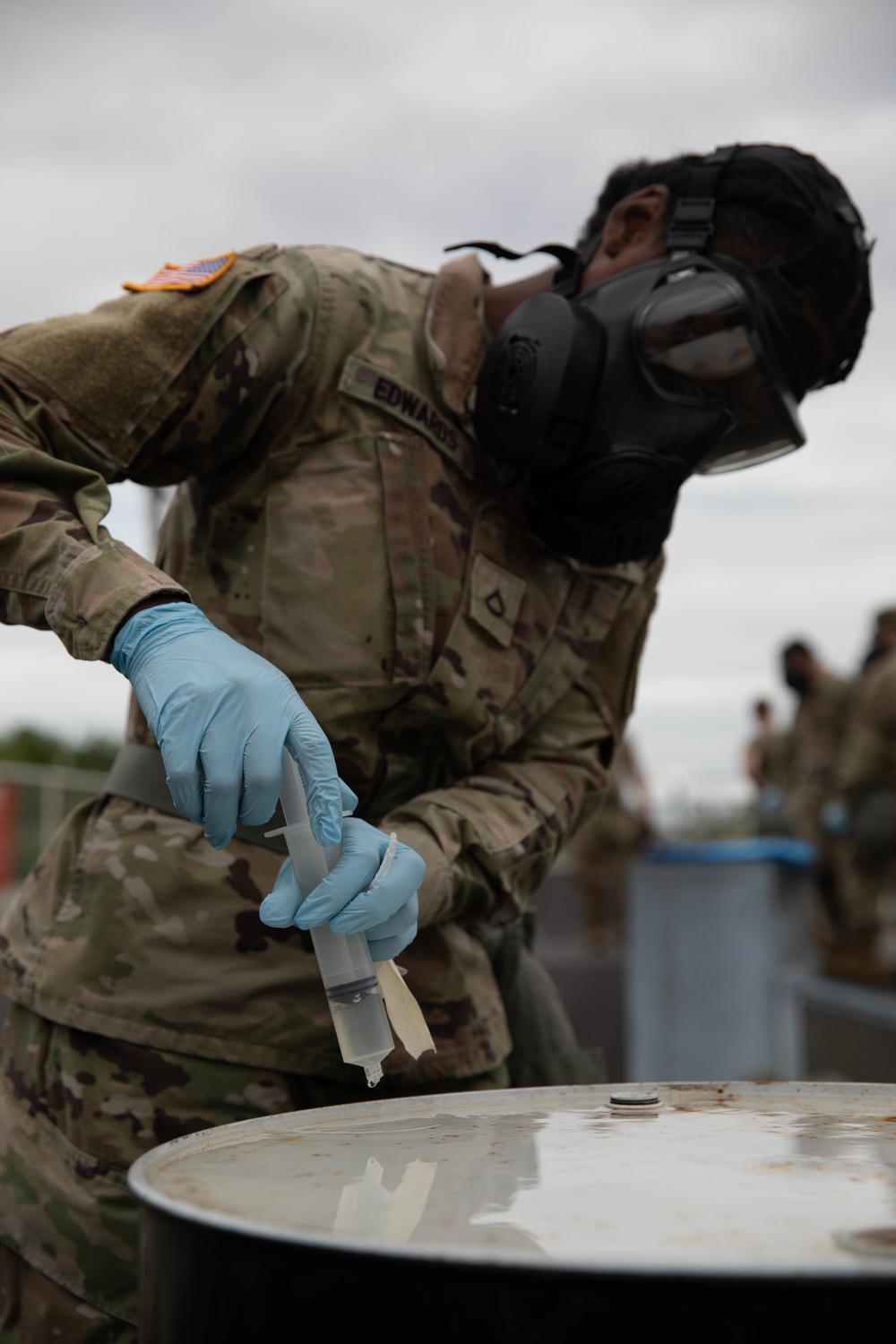 U.S. Marines and Army Soldiers conduct low light CBRN