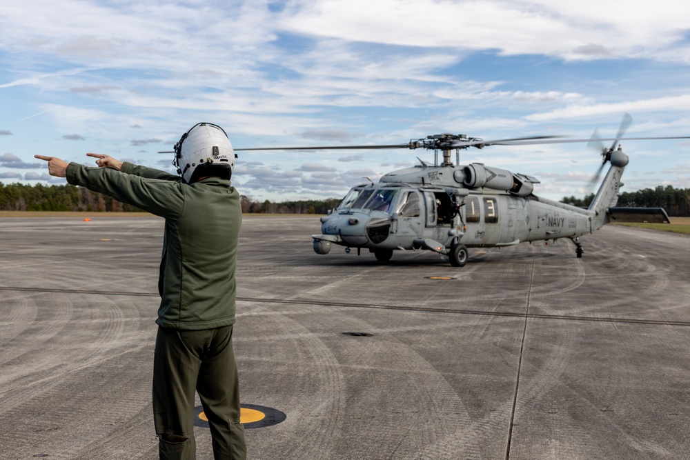 U.S. Marines work with U.S. Navy SEALs