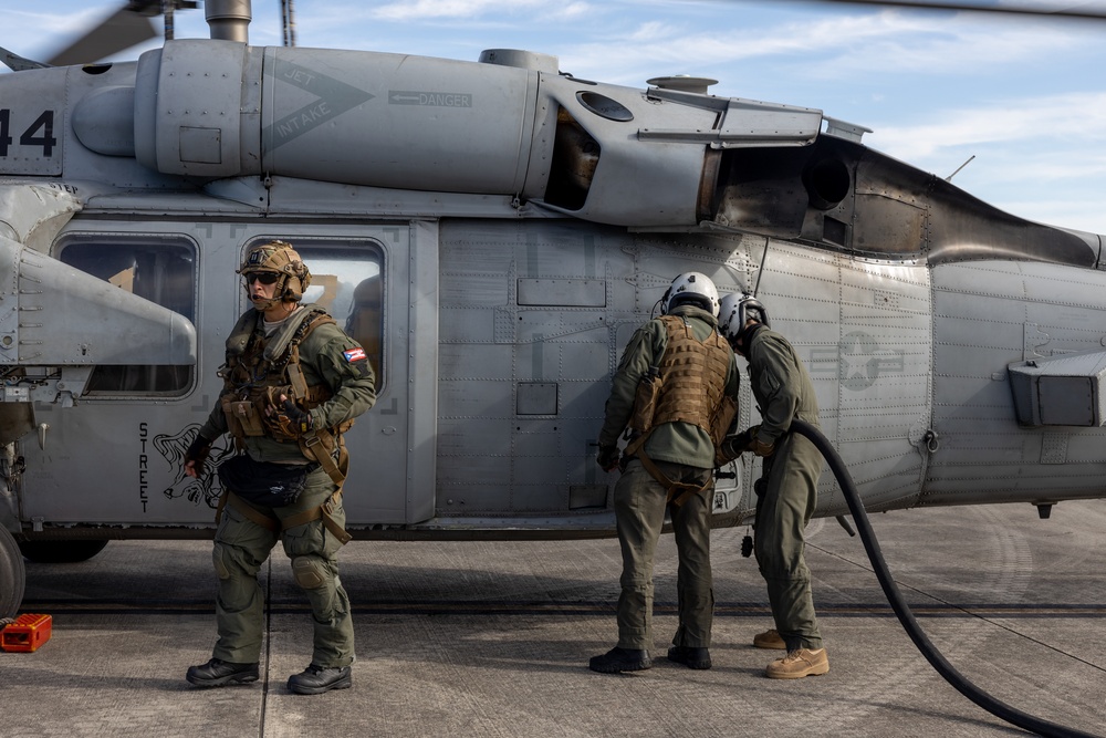 U.S. Marines work with U.S. Navy SEALs