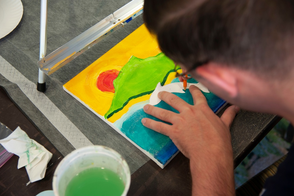 Wounded Warriors participate in painting as part of Warrior Care Month