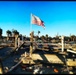 A Flag Blows in the Wind Amid Damage From Hurricane Ian