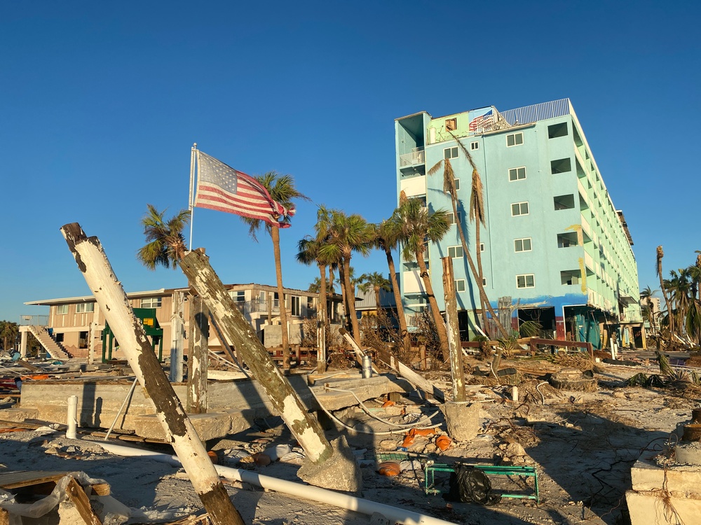 A Flag Blows in the Wind Amid Damage From Hurricane Ian