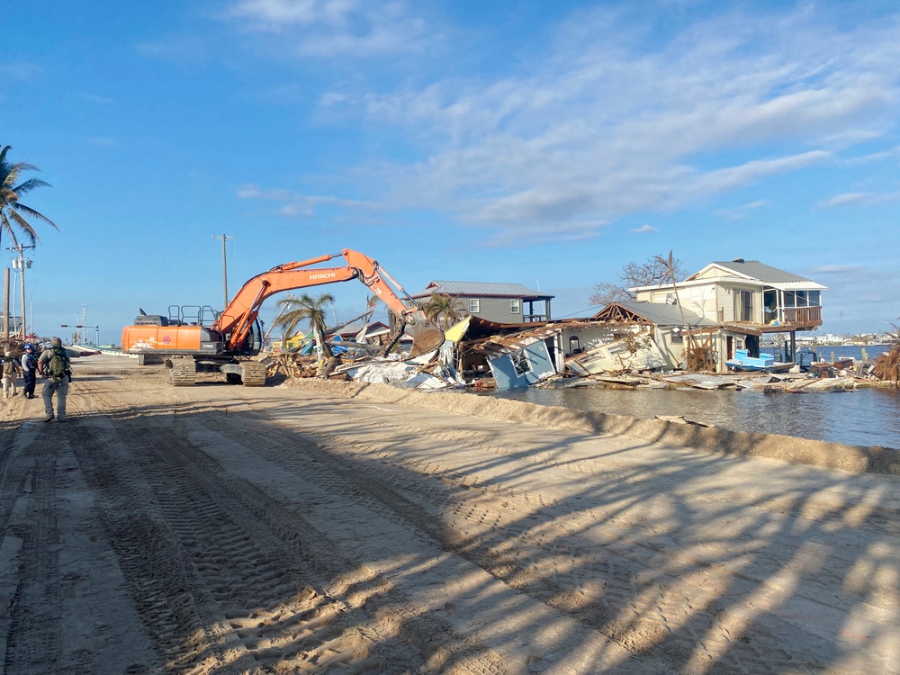 Crews Work to Repair a Roadway Connecting Pine Island