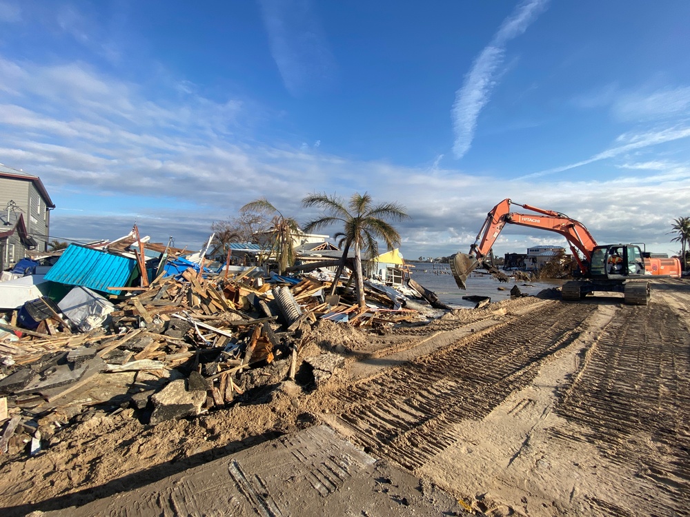 Crews Work to Repair a Roadway Connecting Pine Island