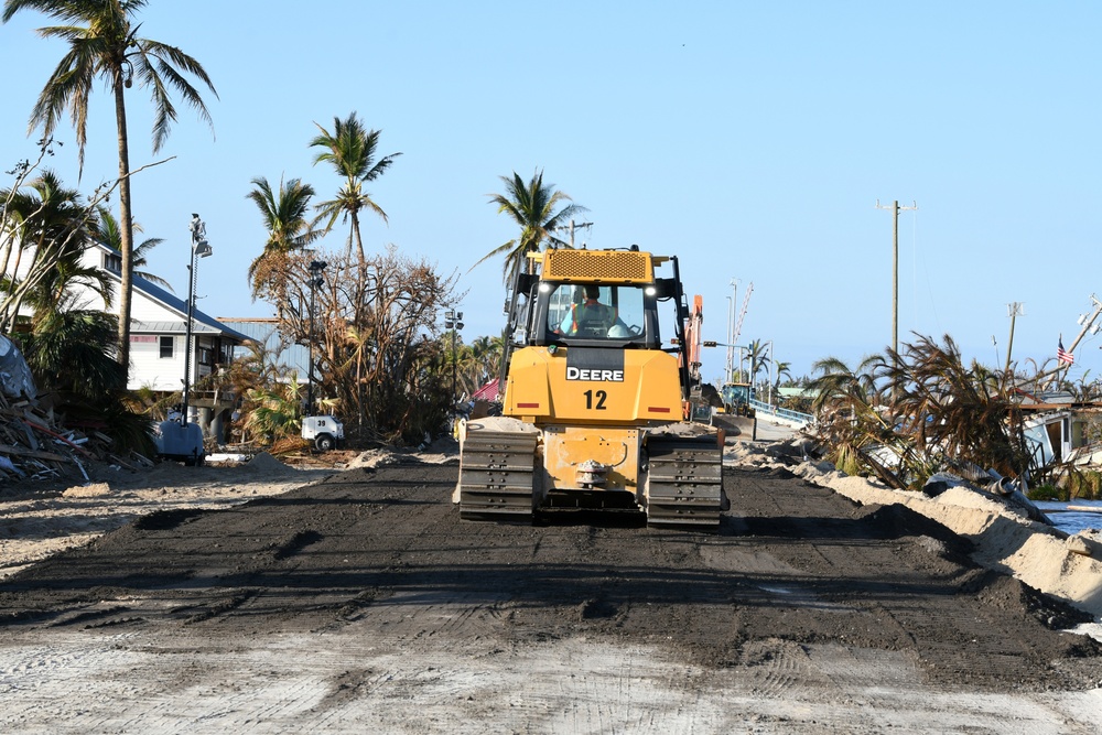 Crews Work to Repair a Roadway Connecting Pine Island