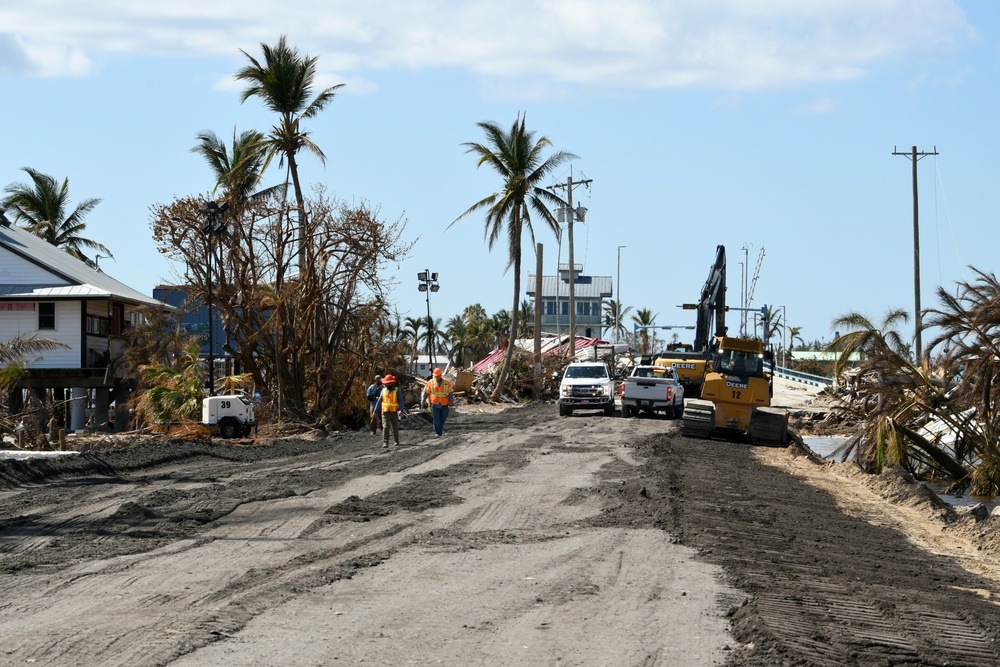 Crews Work to Repair a Roadway Connecting Pine Island