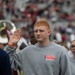 Recruits intending to joint the Florida Army National Guard take oath of enlistement at Florida State University football stadium