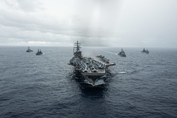 USS Ronald Reagan (CVN 76) conducts trilateral operations with Royal Australian Navy