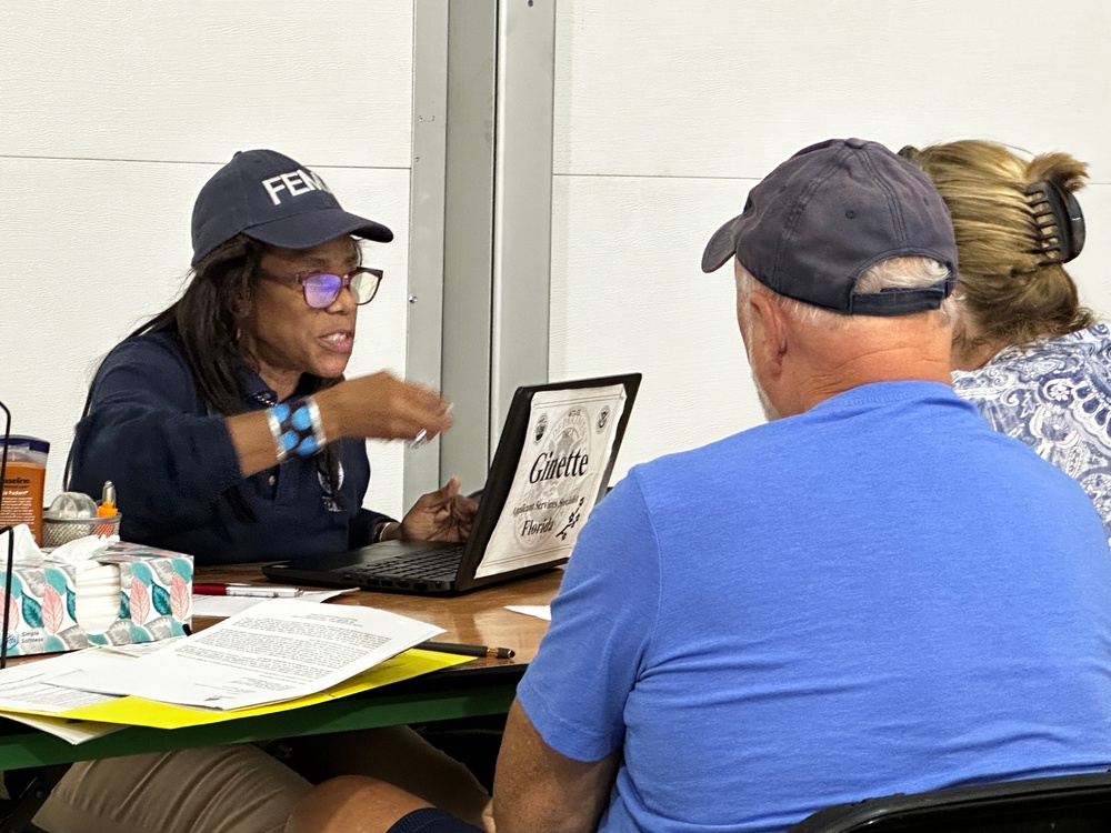 Local Residents Visit a FEMA-State Disaster Recovery Center in Fort Myers Beach