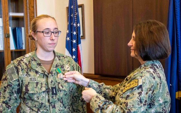 NSTC Commander Presents Award