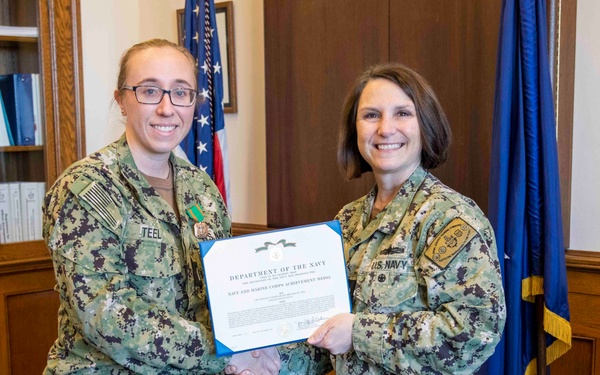 NSTC Commander Presents Award