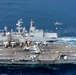 USS Ronald Reagan (CVN 76) conducts replenishment at sea with HMAS Stalwart (A304)