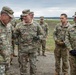 Col. John Morris shows Lt. Gen. John Kolasheski around the Polish Army 33rd Air Base Airfield