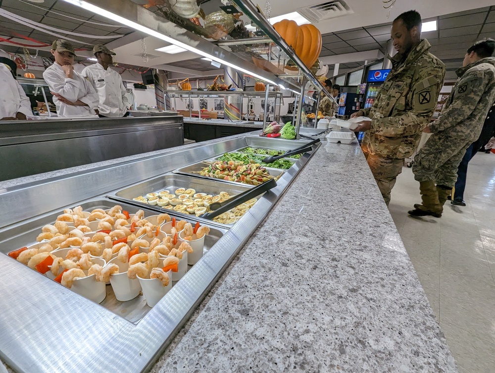 10th Mountain Division culinary specialist cook up special holiday meal for Soldiers, family members