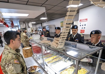 10th Mountain Division culinary specialist cook up special holiday meal for Soldiers, family members