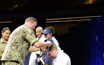 AD1 (Ret.) Austin Parker receiving medals at the 2022 Warrior Games