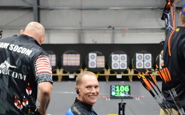 OS1 Travis Wyatt in archery competition at the 2022 Warrior Games