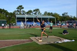 YN2 (Ret.) Aaron Gomez throws a shot in field at the 2022 Warrior Games