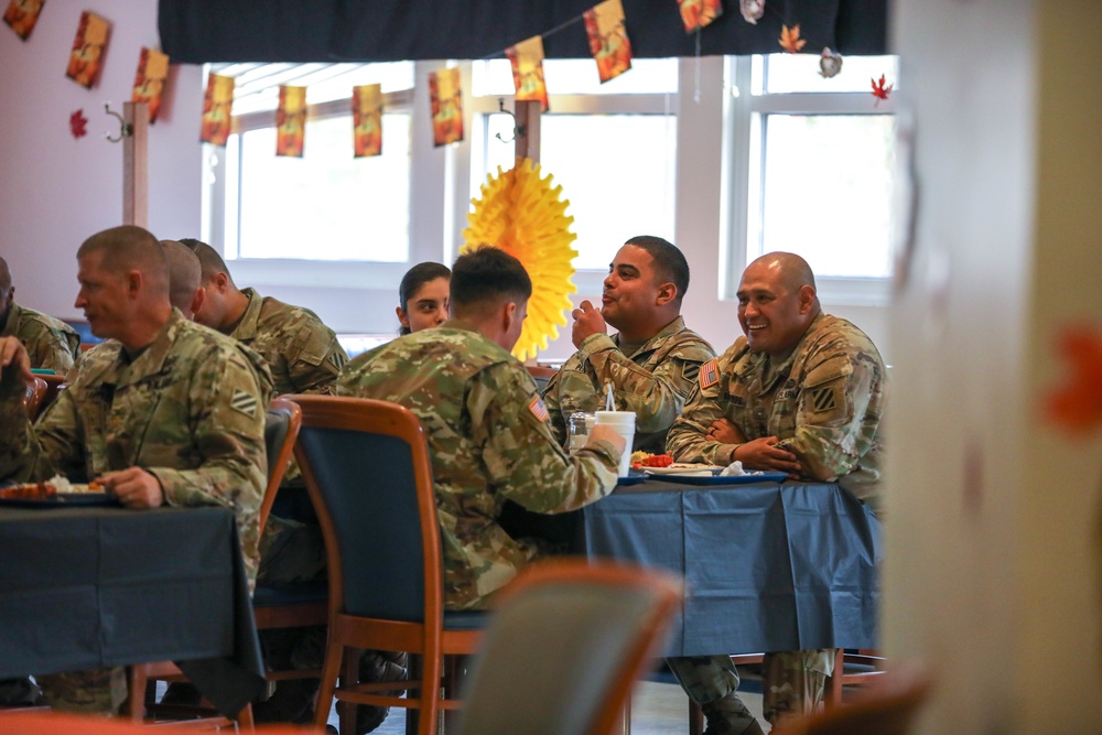 The 3rd Division Sustainment Brigade 3rd Infantry Division serves Soldiers a Thanksgiving holiday meal