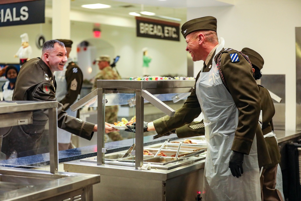 The 3rd Division Sustainment Brigade 3rd Infantry Division serves Soldiers a Thanksgiving holiday meal