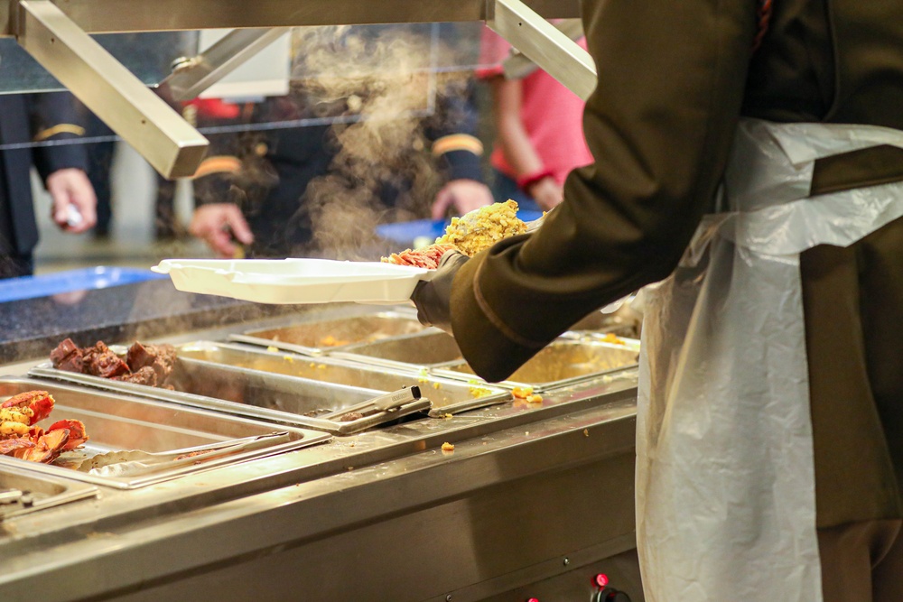 The 3rd Division Sustainment Brigade 3rd Infantry Division serves Soldiers a Thanksgiving holiday meal