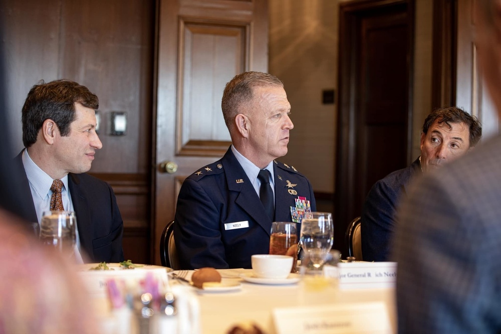 Air Force Maj. Gen. Rich Neely, the Adjutant General of Illinois and Commander of the Illinois National Guard, meets with business leaders for luncheon