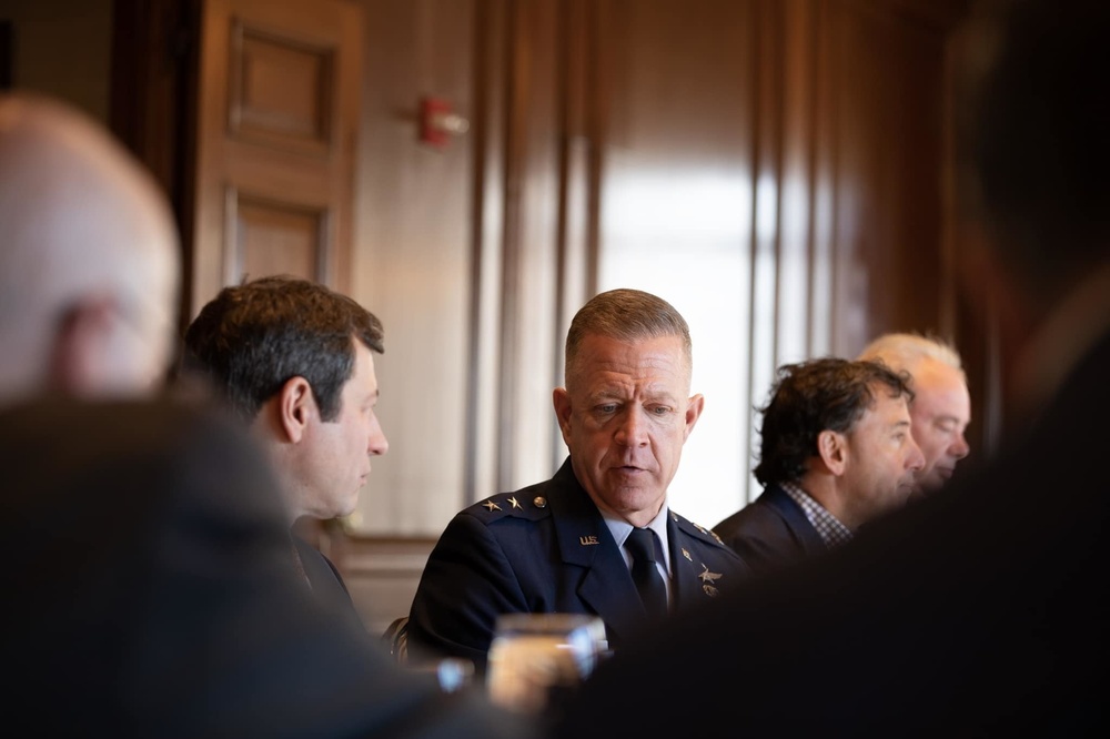 Air Force Maj. Gen. Rich Neely, the Adjutant General of Illinois and Commander of the Illinois National Guard, meets with business leaders for luncheon