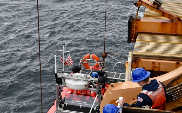USCGC Hamilton personnel conduct small boat pursuit training while operating in the Baltic Sea