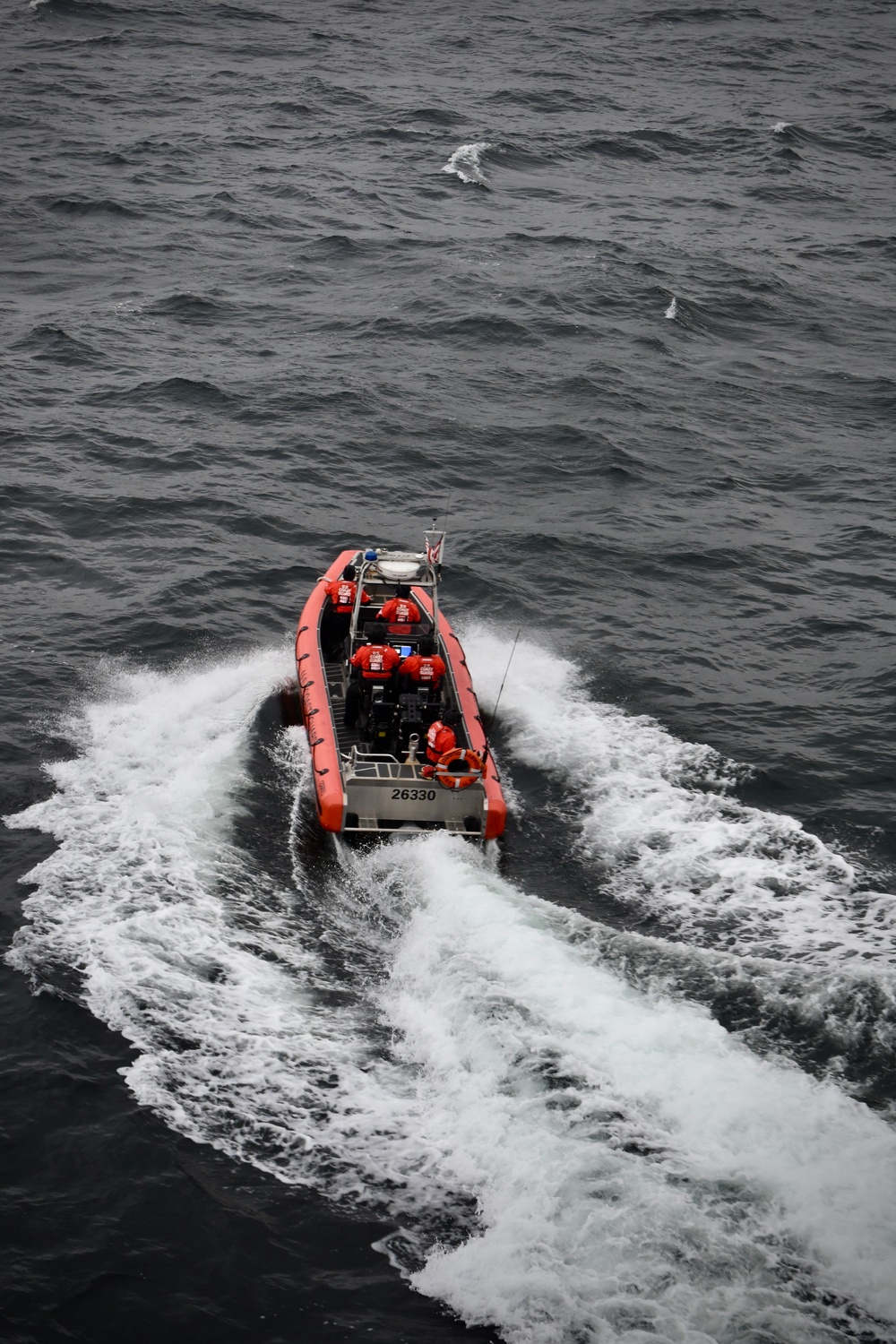 USCGC Hamilton personnel conduct small boat pursuit training while operating in the Baltic Sea