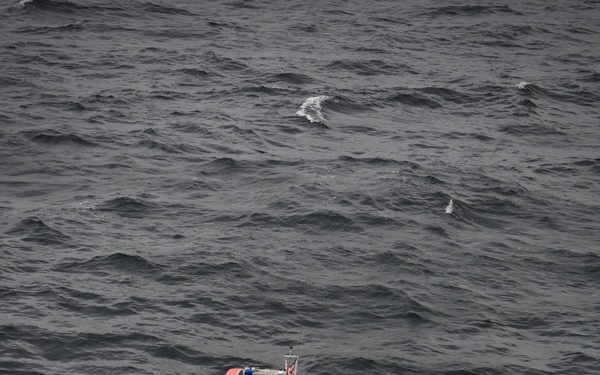 USCGC Hamilton personnel conduct small boat pursuit training while operating in the Baltic Sea