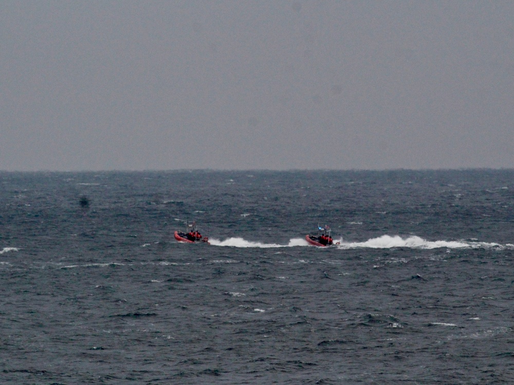USCGC Hamilton personnel conduct small boat pursuit training while operating in the Baltic Sea