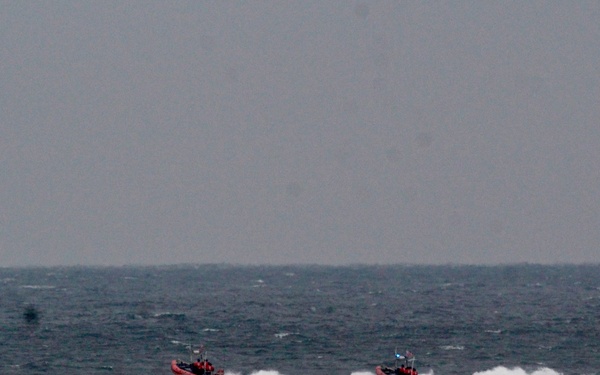 USCGC Hamilton personnel conduct small boat pursuit training while operating in the Baltic Sea