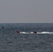 USCGC Hamilton personnel conduct small boat pursuit training while operating in the Baltic Sea