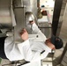 Culinary specialists cook meals for Thanksgiving celebration