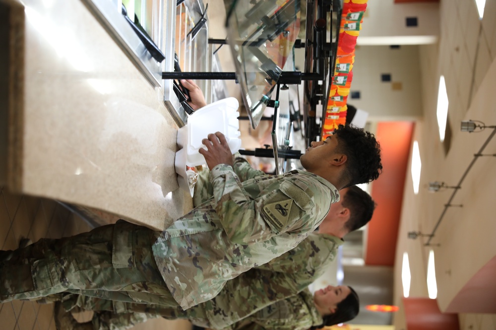 Soldiers enjoy a Thanksgiving meal at dining facility