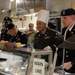 Division Support Brigade command team serves Thanksgiving lunch to Soldiers