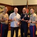 Cutting a cake in honor of the 247th birthday of the Marine Corps with the Mayor and city officials of Honolulu