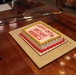 Cutting a cake in honor of the 247th birthday of the Marine Corps with the Mayor and city officials of Honolulu