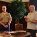 Cutting a cake in honor of the 247th birthday of the Marine Corps with the Mayor and city officials of Honolulu