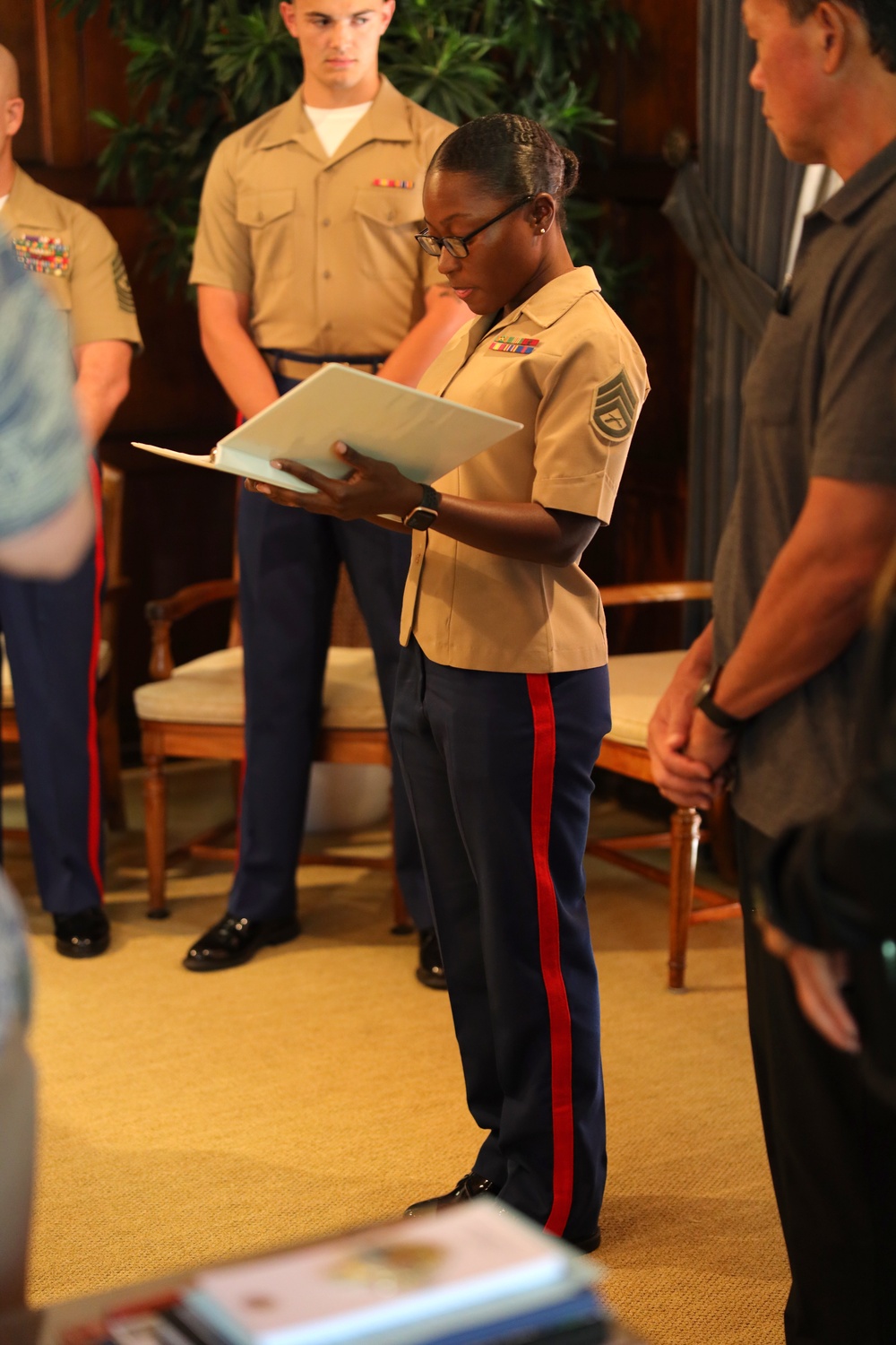 Cutting a cake in honor of the 247th birthday of the Marine Corps with the Mayor and city officials of Honolulu