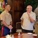 Cutting a cake in honor of the 247th birthday of the Marine Corps with the Mayor and city officials of Honolulu