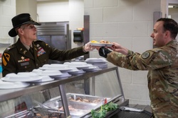 Leadership serving Thanksgiving meals [Image 2 of 7]