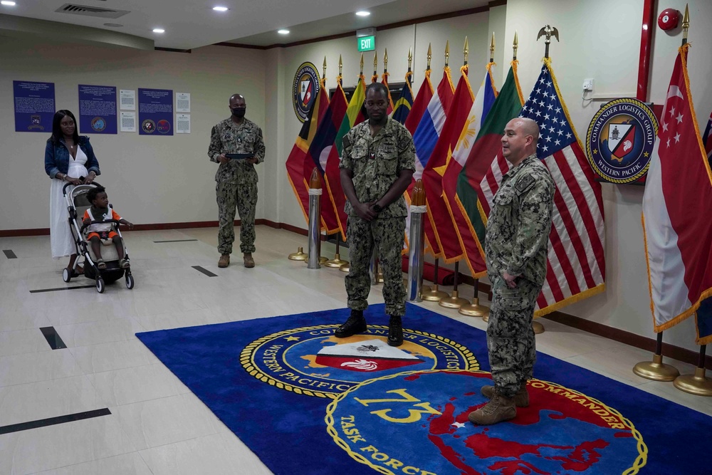 YN1 Thompson Re-enlists
