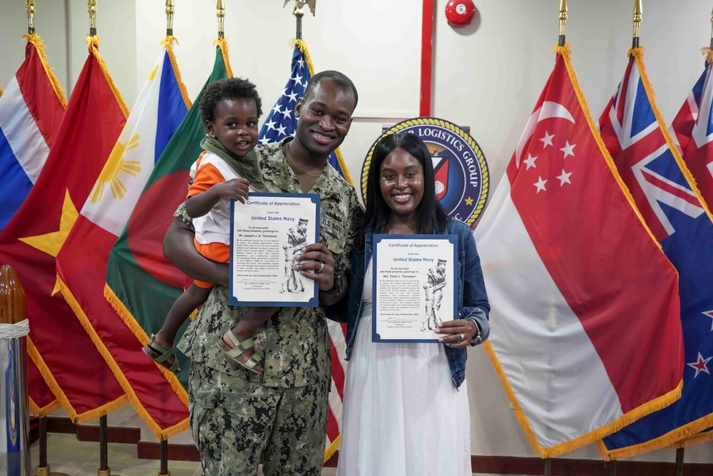 YN1 Thompson Re-enlists