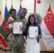 YN1 Thompson Re-enlists