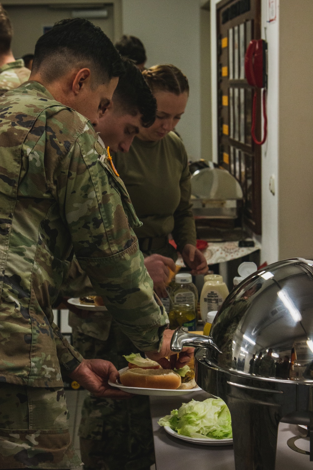 Soldiers with 41st FAB HHB BDE celebrate their new partnership with representatives from the community of Flossenbürg at Grafenwoehr, Germany