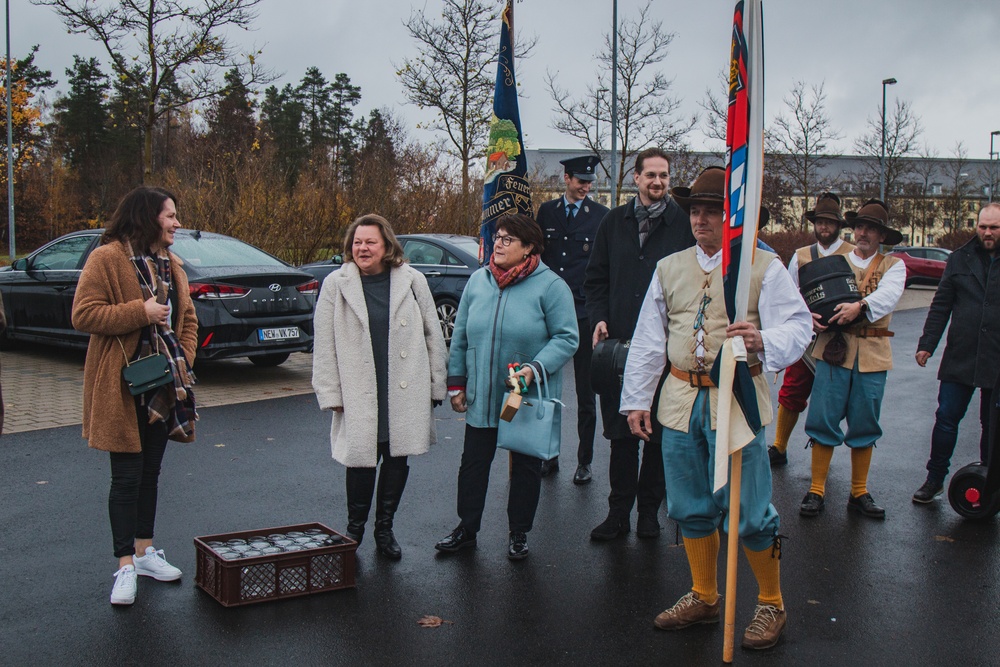 Soldiers with 41st FAB HHB BDE celebrate their new partnership with representatives from the community of Flossenbürg at Grafenwoehr, Germany