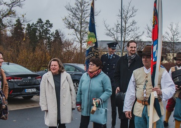 Soldiers with 41st FAB HHB BDE celebrate their new partnership with representatives from the community of Flossenbürg at Grafenwoehr, Germany